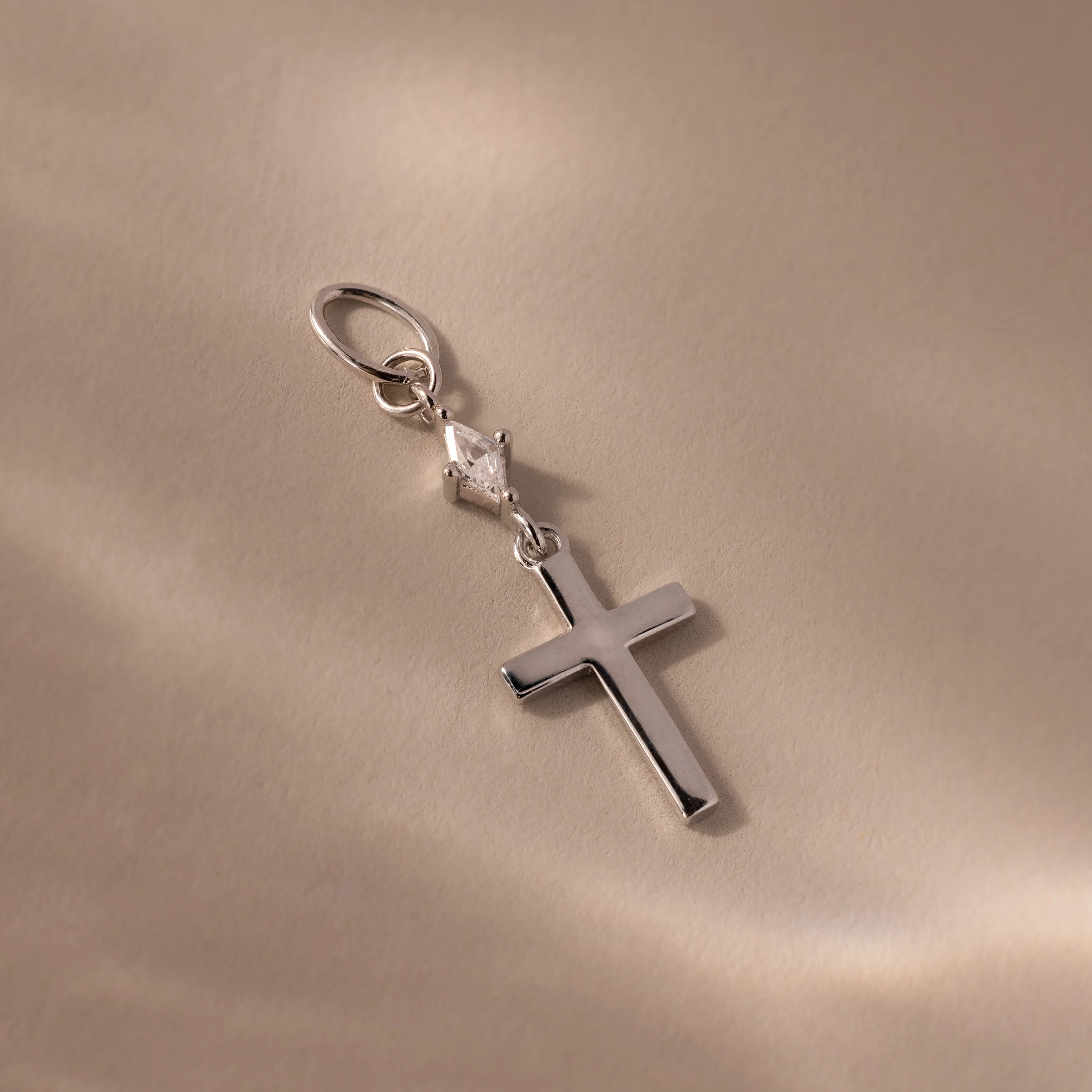 Diamond Drop Cross Charm in Silver