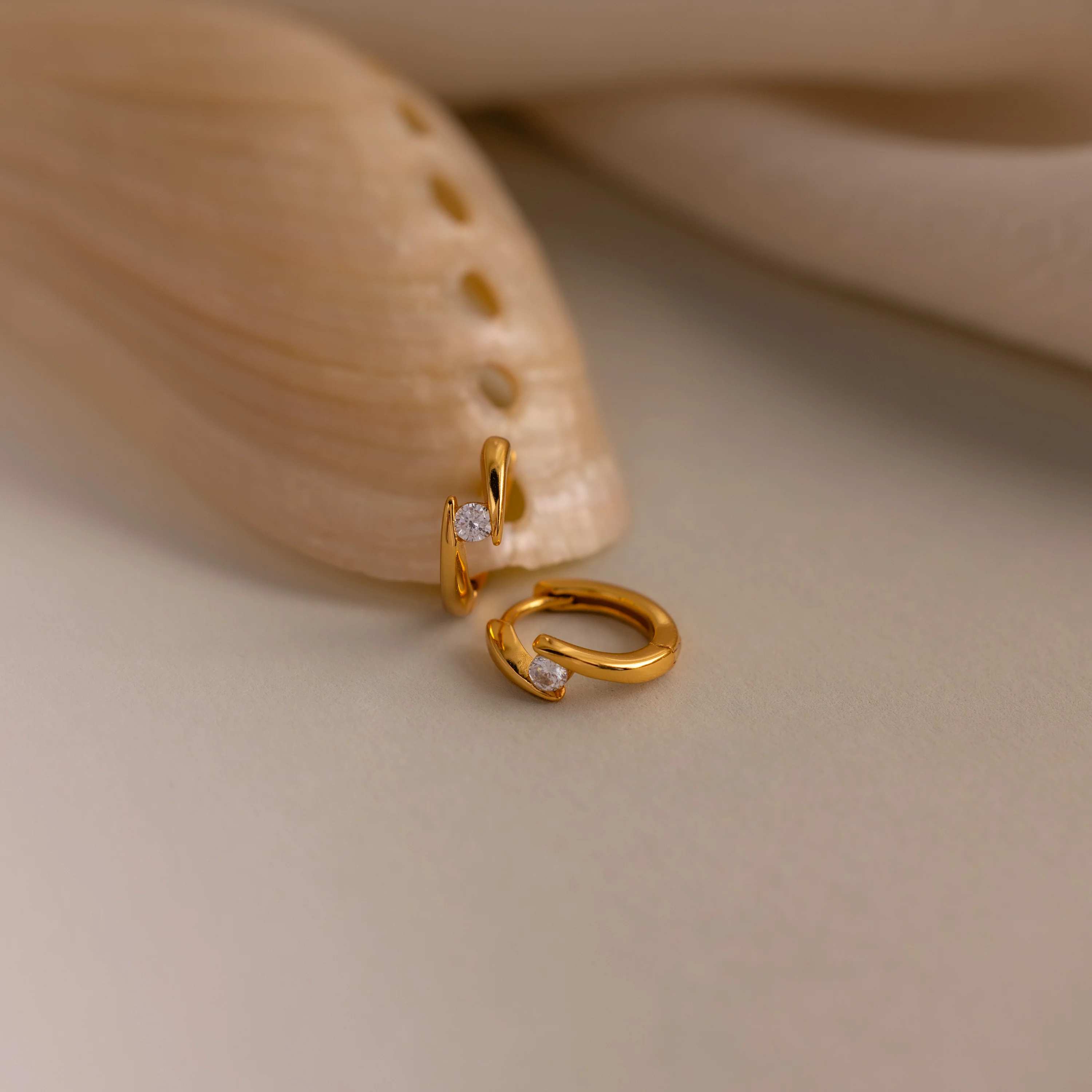 Floating Topaz Huggies - Image 3