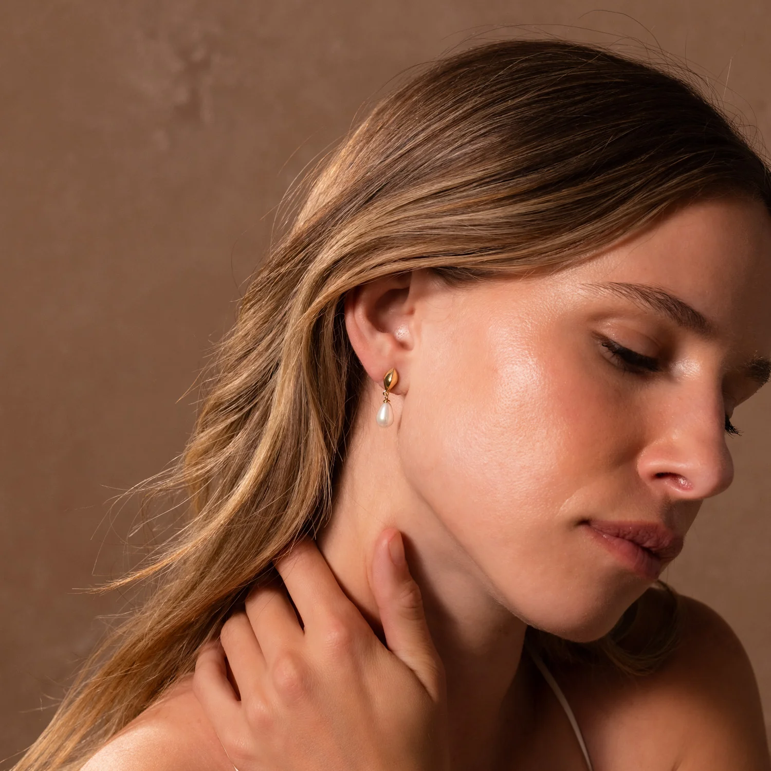Tiny Pearl Drop Studs in 18K Gold - Image 4
